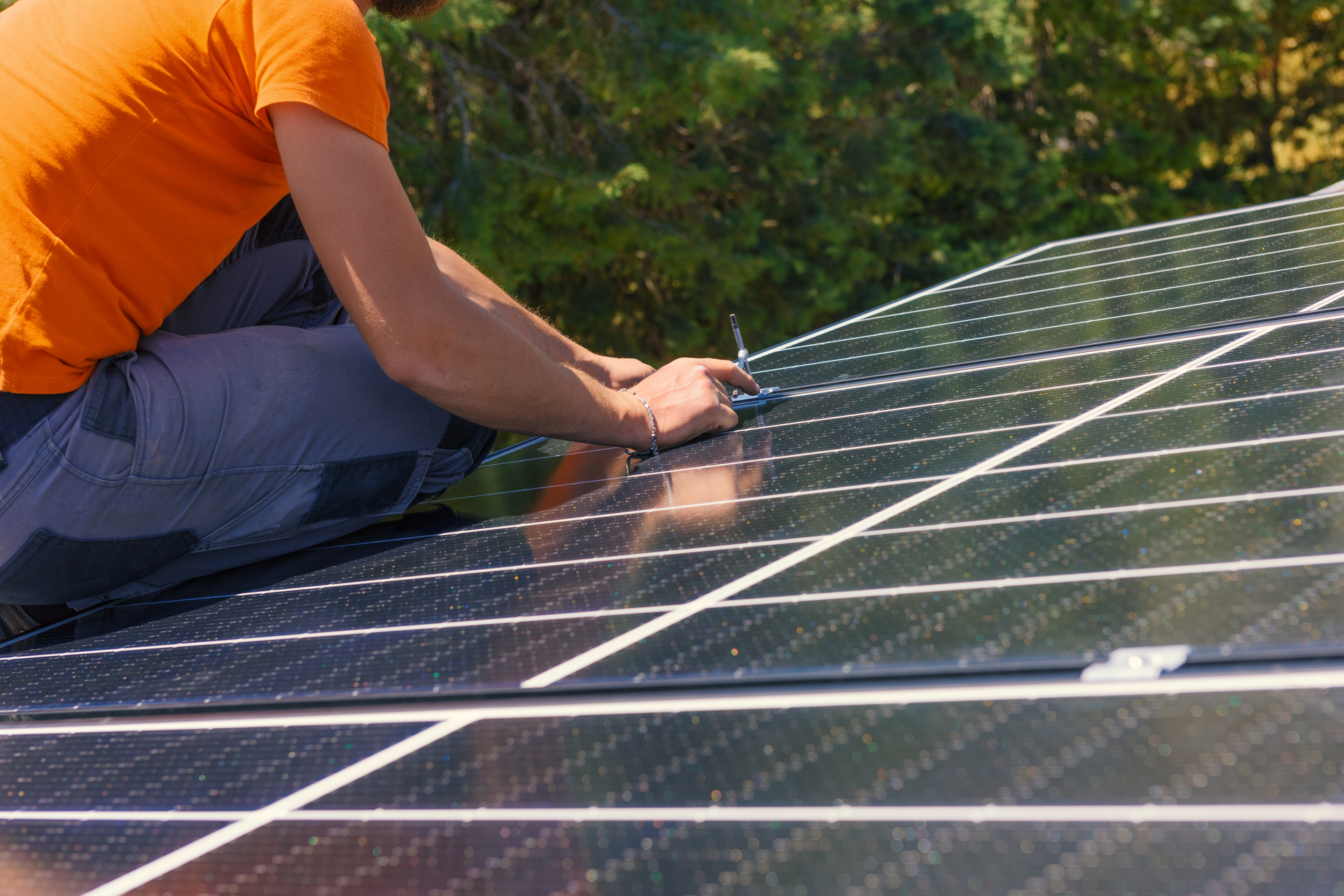 Solar installer at work on site